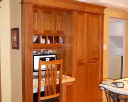 Finishing Carpentry: Cherry built-in cabinet